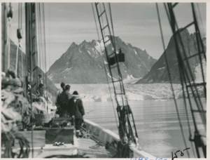 Image: Miriam and others standing forward looking at glacier